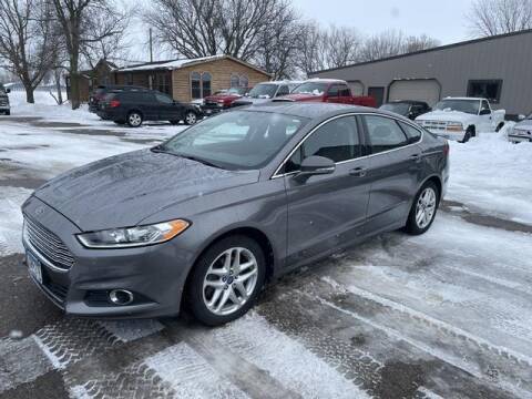 2013 Ford Fusion for sale at COUNTRYSIDE AUTO INC in Austin MN