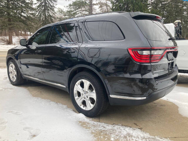 2015 Dodge Durango for sale at Chuckie Bizzarro's Fleetwing Auto in Erie, PA