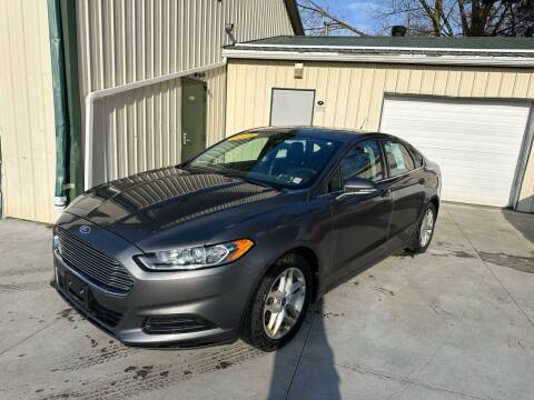 2014 Ford Fusion for sale at Bob's Irresistible Auto Sales in Erie PA