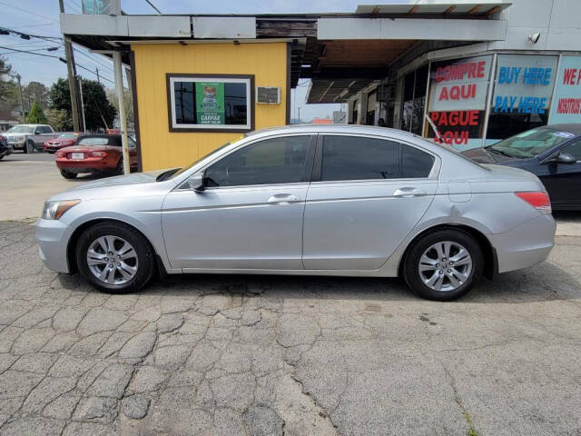 2012 Honda Accord for sale at DAGO'S AUTO SALES LLC in Dalton, GA