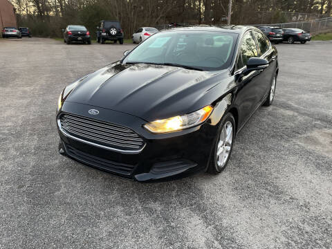 2014 Ford Fusion for sale at Certified Motors LLC in Mableton GA