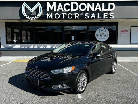 2014 Ford Fusion for sale at MacDonald Motor Sales in High Point NC