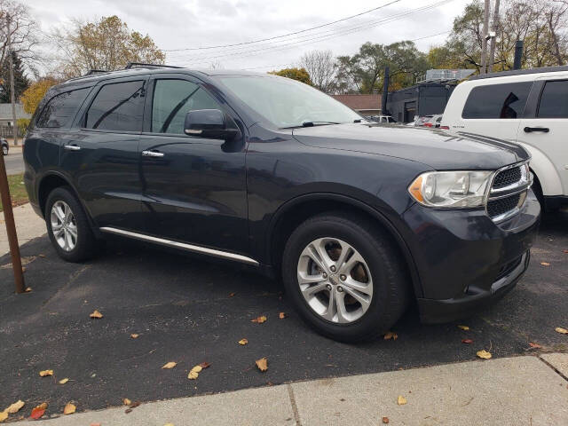 2013 Dodge Durango for sale at Auto Shop in Wyoming, MI