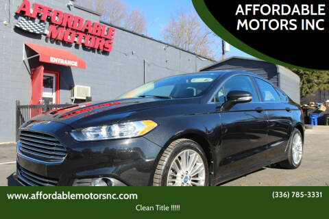 2014 Ford Fusion for sale at AFFORDABLE MOTORS INC in Winston Salem NC