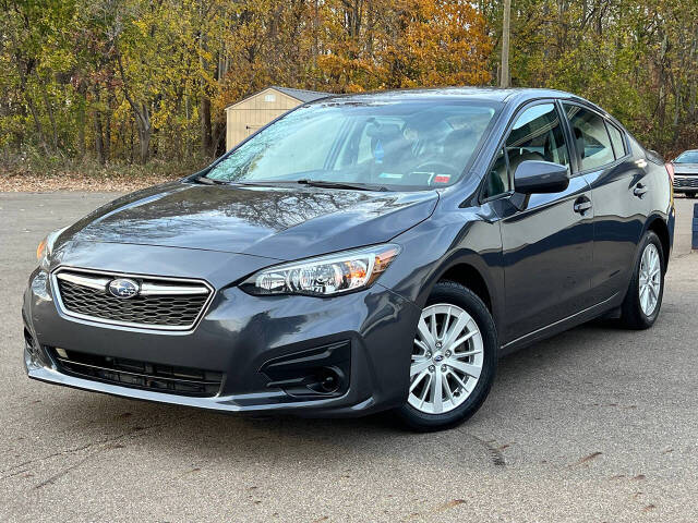 2017 Subaru Impreza for sale at Spartan Elite Auto Group LLC in Lansing, MI