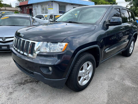2013 Jeep Grand Cherokee for sale at Plus Auto Sales in West Park FL