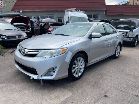 2013 Toyota Camry for sale at STS Automotive in Denver CO