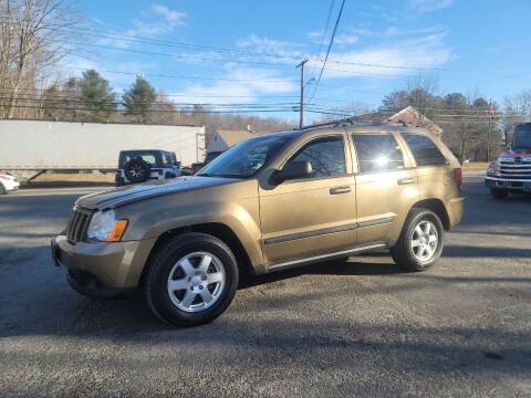 2009 Jeep Grand Cherokee for sale at Hometown Automotive Service & Sales in Holliston MA