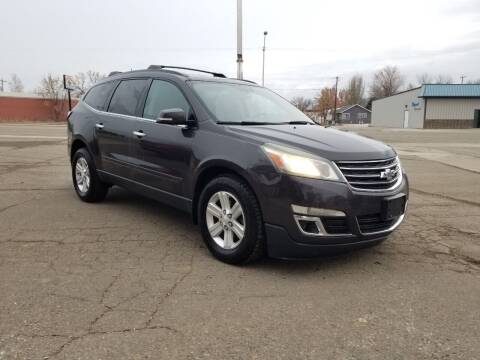 2014 Chevrolet Traverse for sale at KHAN'S AUTO LLC in Worland WY