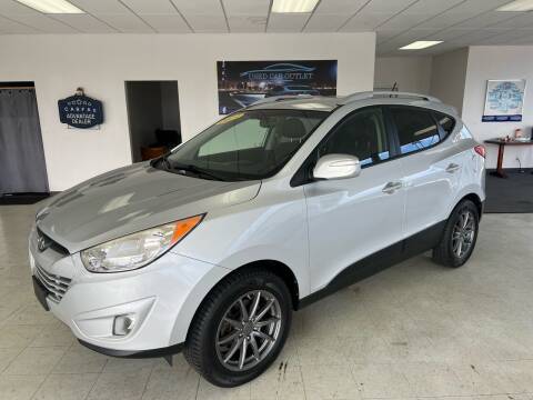 2013 Hyundai Tucson for sale at Used Car Outlet in Bloomington IL
