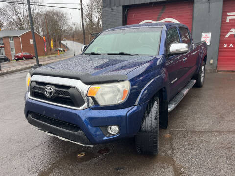 2015 Toyota Tacoma for sale at Apple Auto Sales Inc in Camillus NY