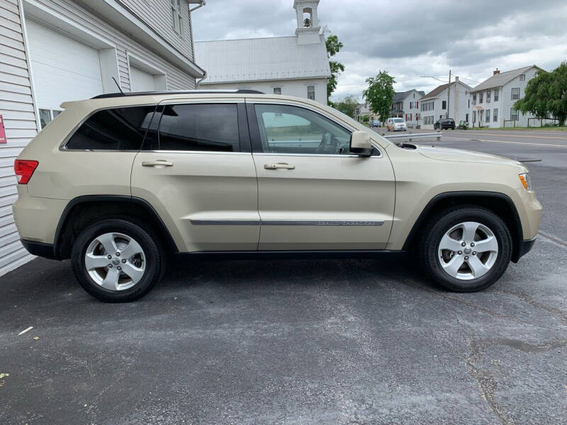 2011 Jeep Grand Cherokee for sale at VILLAGE SERVICE CENTER in Penns Creek PA