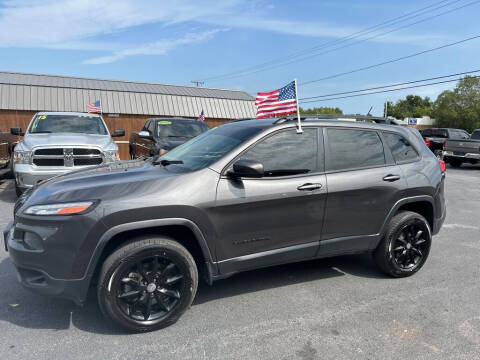 2014 Jeep Cherokee for sale at CarTime in Rogers AR