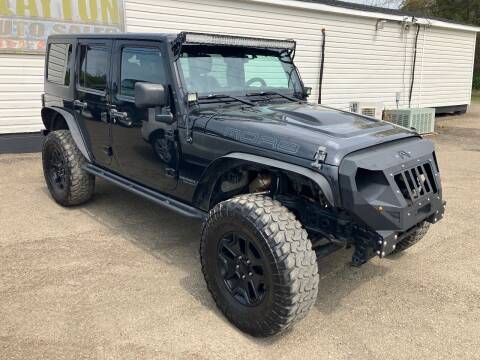 2013 Jeep Wrangler Unlimited for sale at Clayton Auto Sales in Winston-Salem NC