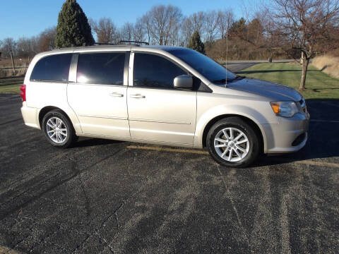 2014 Dodge Grand Caravan for sale at Crossroads Used Cars Inc. in Tremont IL