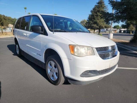 2015 Dodge Grand Caravan for sale at Empire Motors in Acton CA