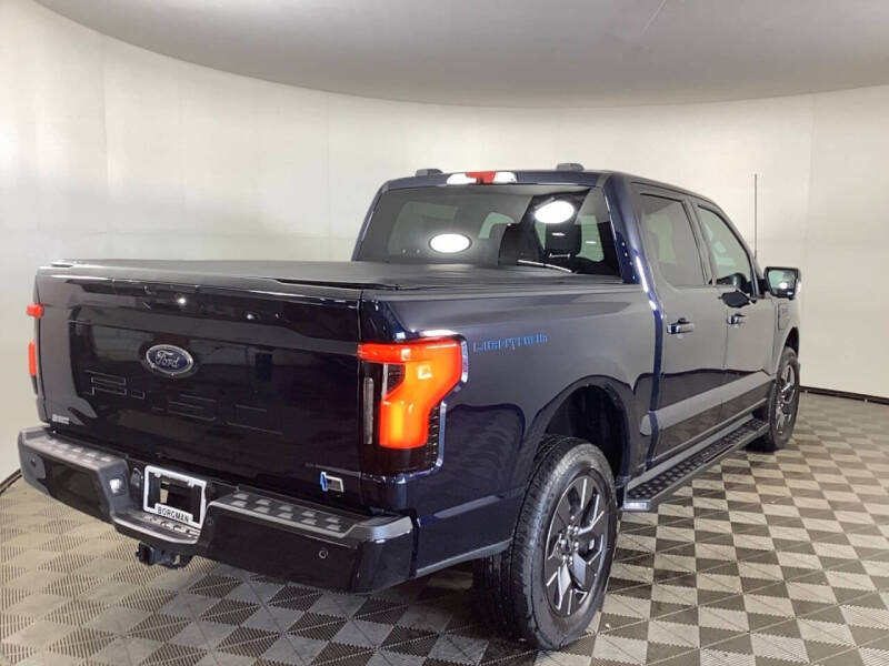 Used 2023 Ford F-150 Lightning XLT with VIN 1FTVW1EL2PWG55362 for sale in Grandville, MI