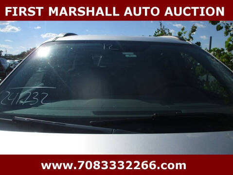 2012 Chevrolet Traverse for sale at First Marshall Auto Auction in Harvey IL