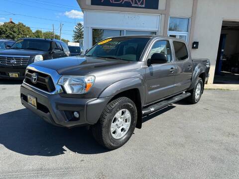 2014 Toyota Tacoma for sale at ADAM AUTO AGENCY in Rensselaer NY