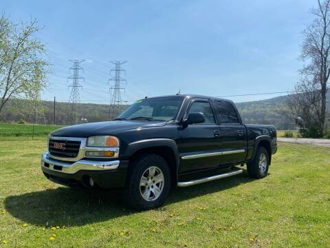 2004 GMC Sierra 1500 for sale at Tennessee Valley Wholesale Autos LLC in Huntsville AL