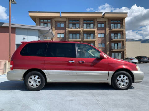 2003 Kia Sedona for sale at BITTON'S AUTO SALES in Ogden UT