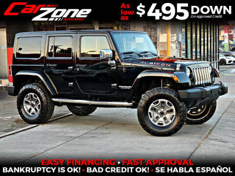 2014 Jeep Wrangler Unlimited for sale at Carzone Automall in South Gate CA
