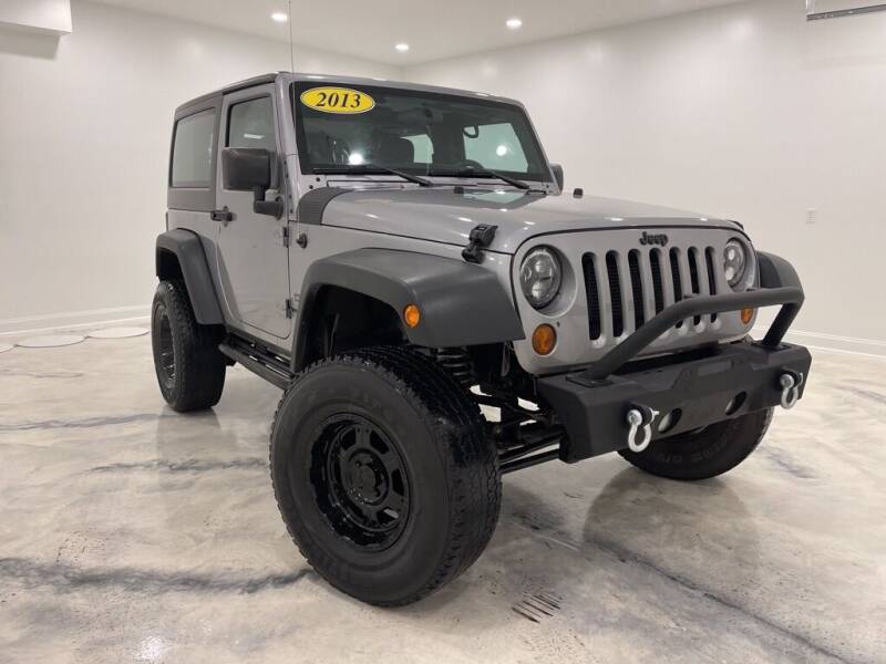 2013 Jeep Wrangler for sale at Auto House of Bloomington in Bloomington IL