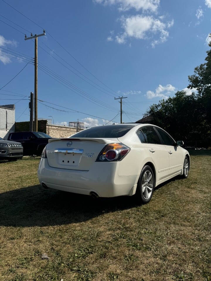 2012 Nissan Altima for sale at H & H AUTO GROUP in Detroit, MI