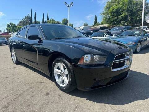 2012 Dodge Charger for sale at DREAM CARS in Stuart FL