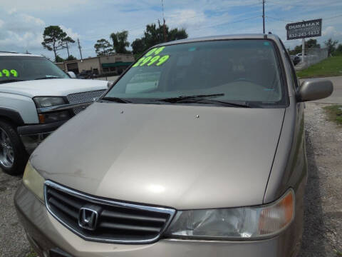 2004 Honda Odyssey for sale at SCOTT HARRISON MOTOR CO in Houston TX