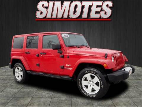 2012 Jeep Wrangler Unlimited for sale at SIMOTES MOTORS in Minooka IL