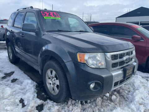 2009 Ford Escape for sale at BELOW BOOK AUTO SALES in Idaho Falls ID