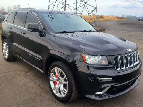 2013 Jeep Grand Cherokee for sale at BELOW BOOK AUTO SALES in Idaho Falls ID