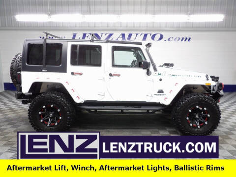 2015 Jeep Wrangler Unlimited for sale at LENZ TRUCK CENTER in Fond Du Lac WI