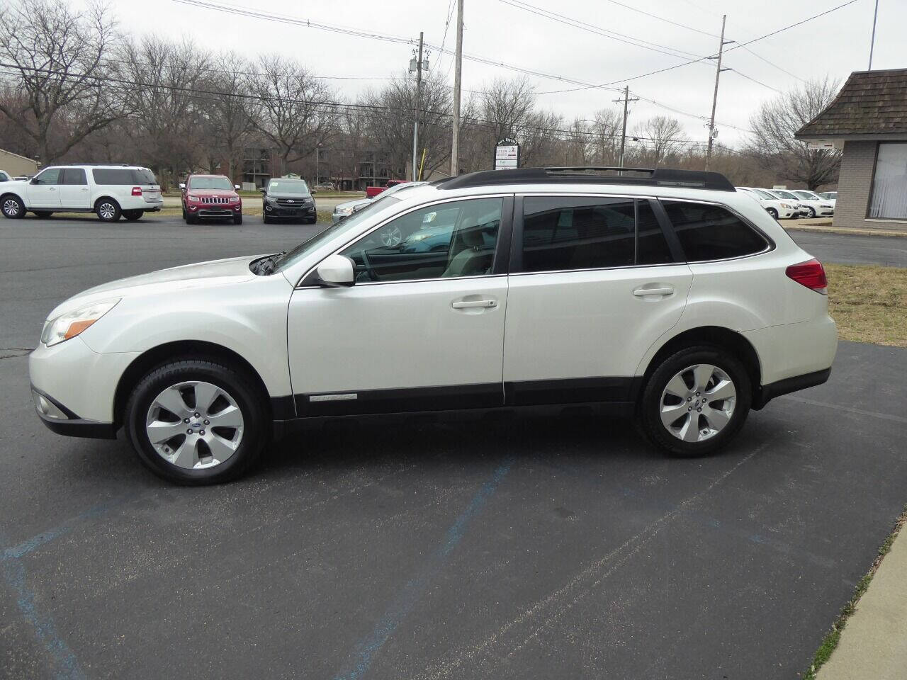 2011 Subaru Outback for sale at Lakeshore Autos in Holland, MI