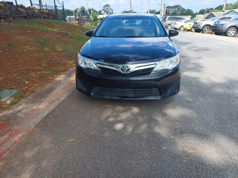 2013 Toyota Camry for sale at Star Car in Woodstock GA