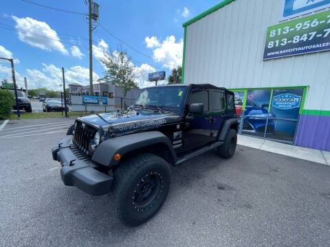 2015 Jeep Wrangler Unlimited for sale at Bay City Autosales in Tampa FL