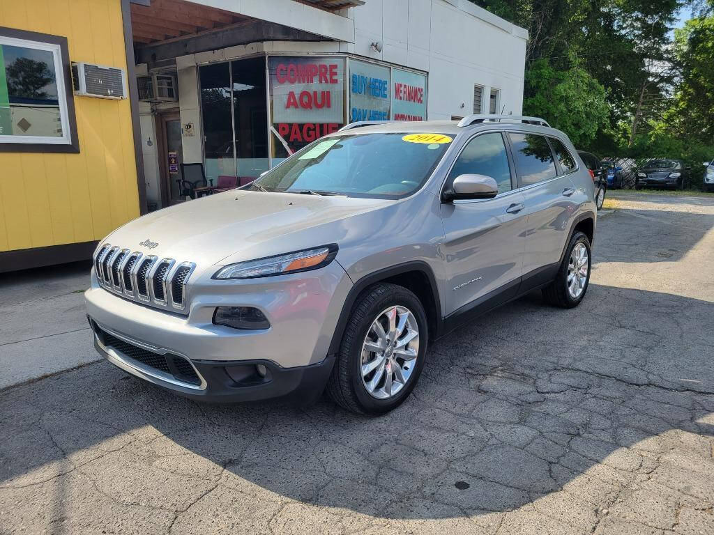 2014 Jeep Cherokee for sale at DAGO'S AUTO SALES LLC in Dalton, GA