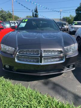 2014 Dodge Charger for sale at ROMO'S AUTO SALES in Los Angeles CA