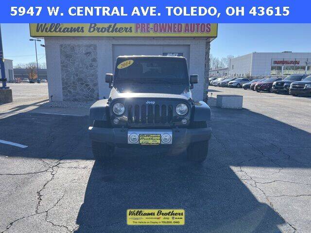 2014 Jeep Wrangler Unlimited for sale at Williams Brothers Pre-Owned Clinton in Clinton MI