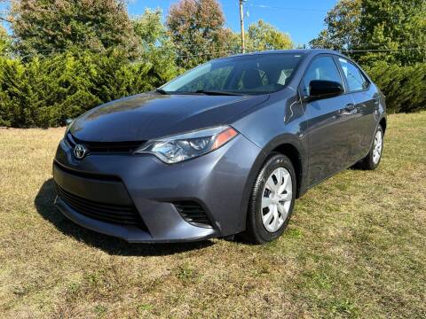 2014 Toyota Corolla for sale at PUTNAM AUTO SALES INC in Marietta OH