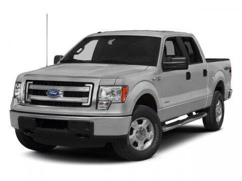 2013 Ford F-150 for sale at HILAND TOYOTA in Moline IL