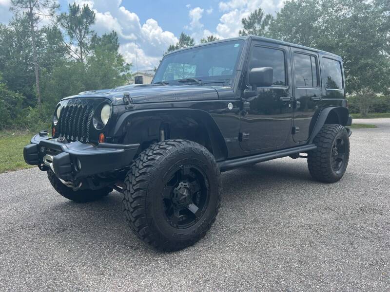 2013 Jeep Wrangler Unlimited for sale at VASS Automotive in Deland FL