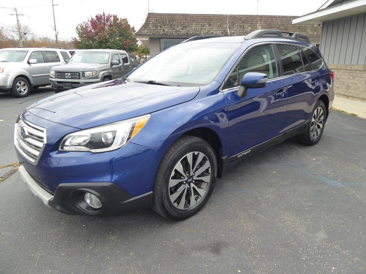 2016 Subaru Outback for sale at Lakeshore Autos in Holland, MI