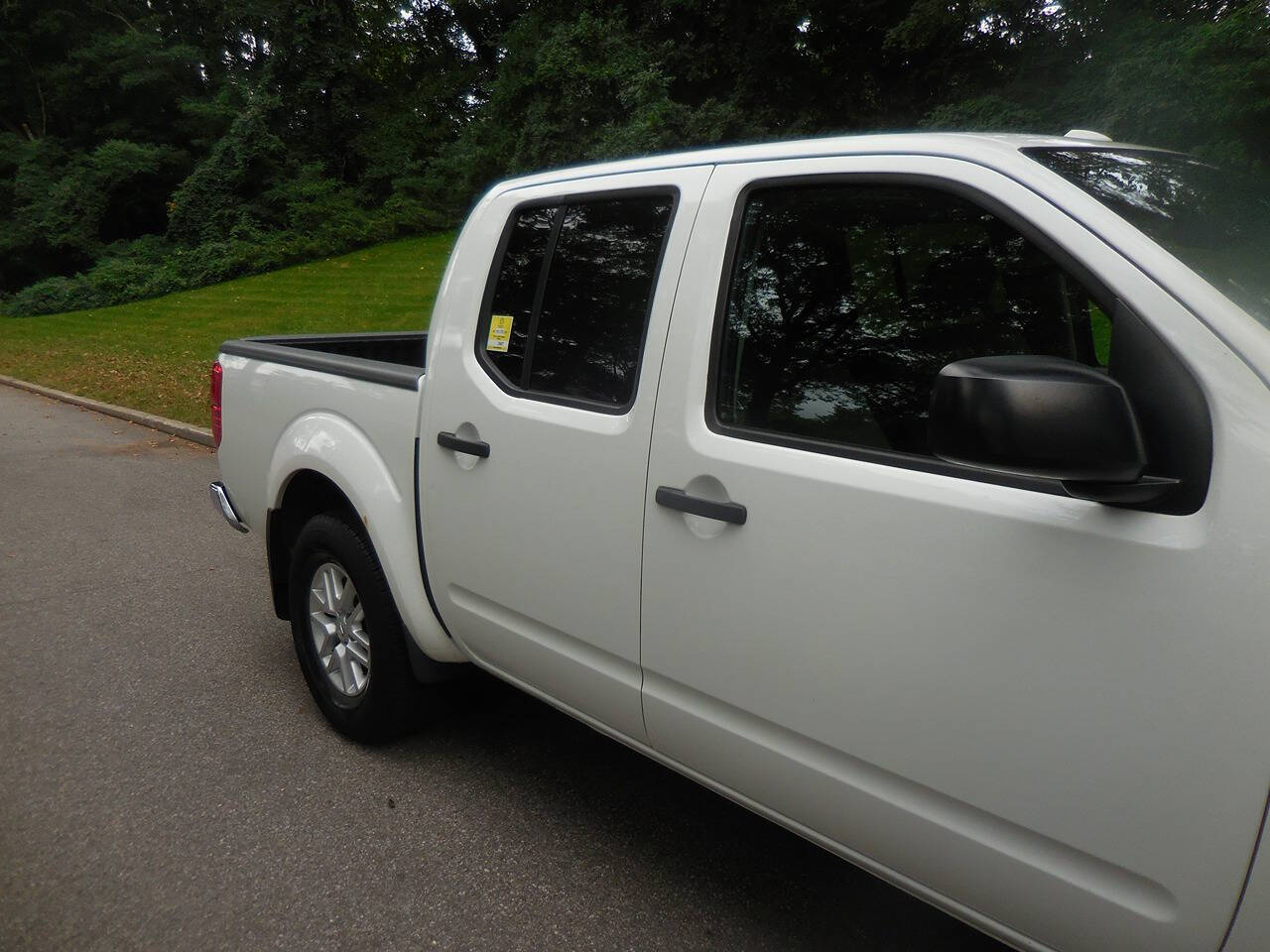 2015 Nissan Frontier for sale at PRESTIGE MOTORS LEASING CORP in Roslyn Heights, NY