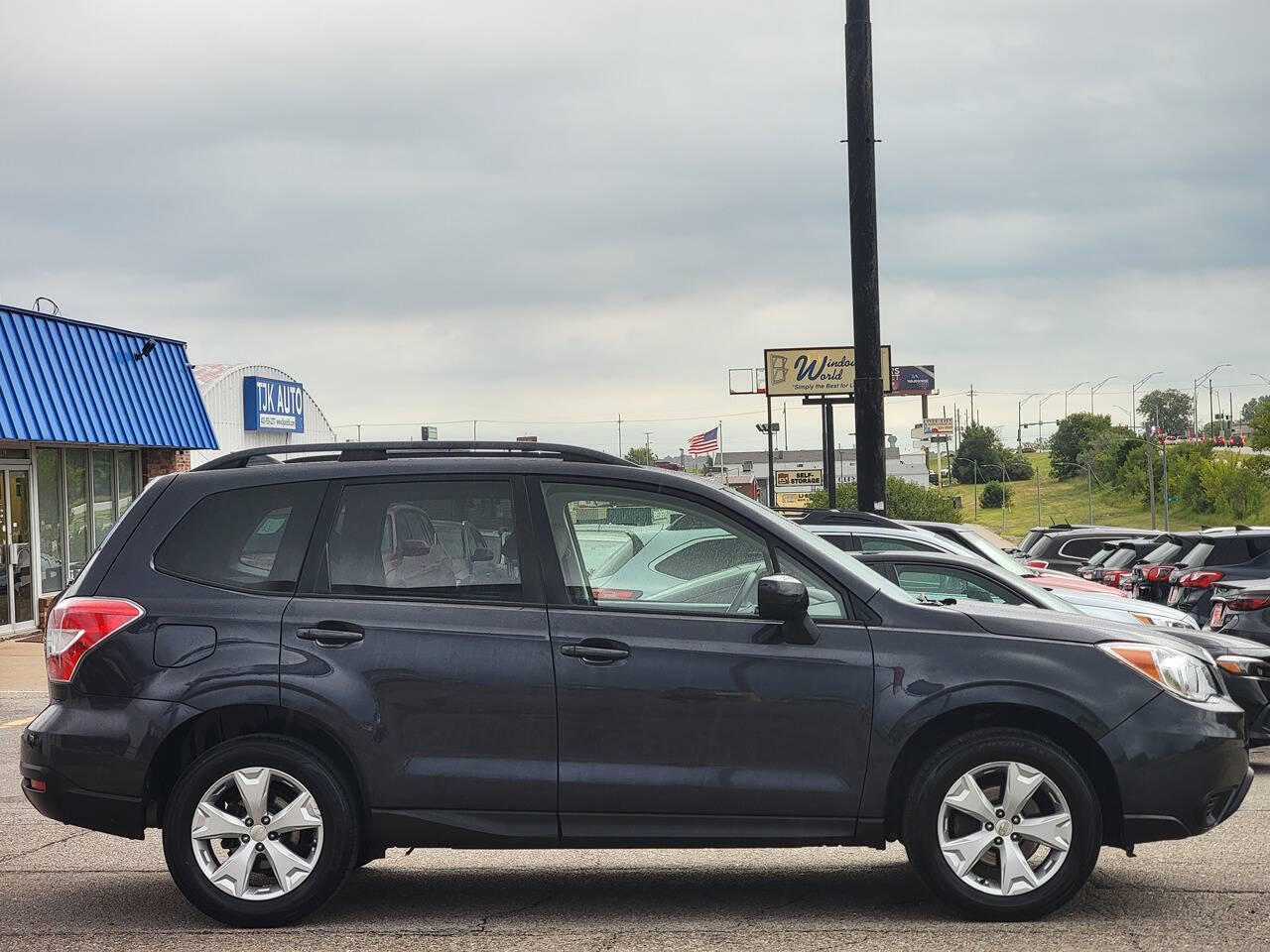 2016 Subaru Forester for sale at Optimus Auto in Omaha, NE