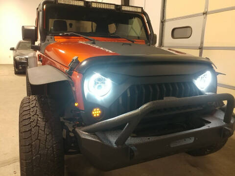 2011 Jeep Wrangler for sale at MULTI GROUP AUTOMOTIVE in Doraville GA