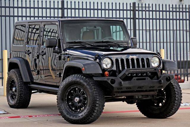2011 Jeep Wrangler Unlimited for sale at Schneck Motor Company in Plano TX