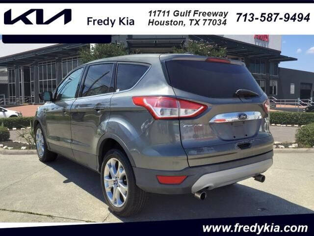 Used 2013 Ford Escape SEL with VIN 1FMCU0HX0DUB46007 for sale in Houston, TX