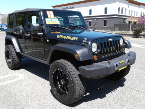 2012 Jeep Wrangler Unlimited for sale at Super Car Sales Inc. in Oakdale CA
